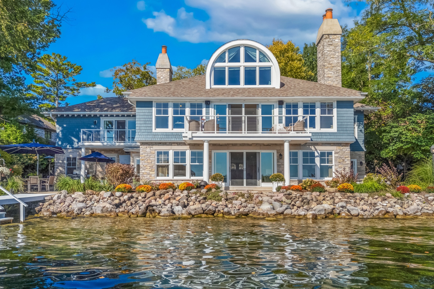 Arched dormer and full glass facade